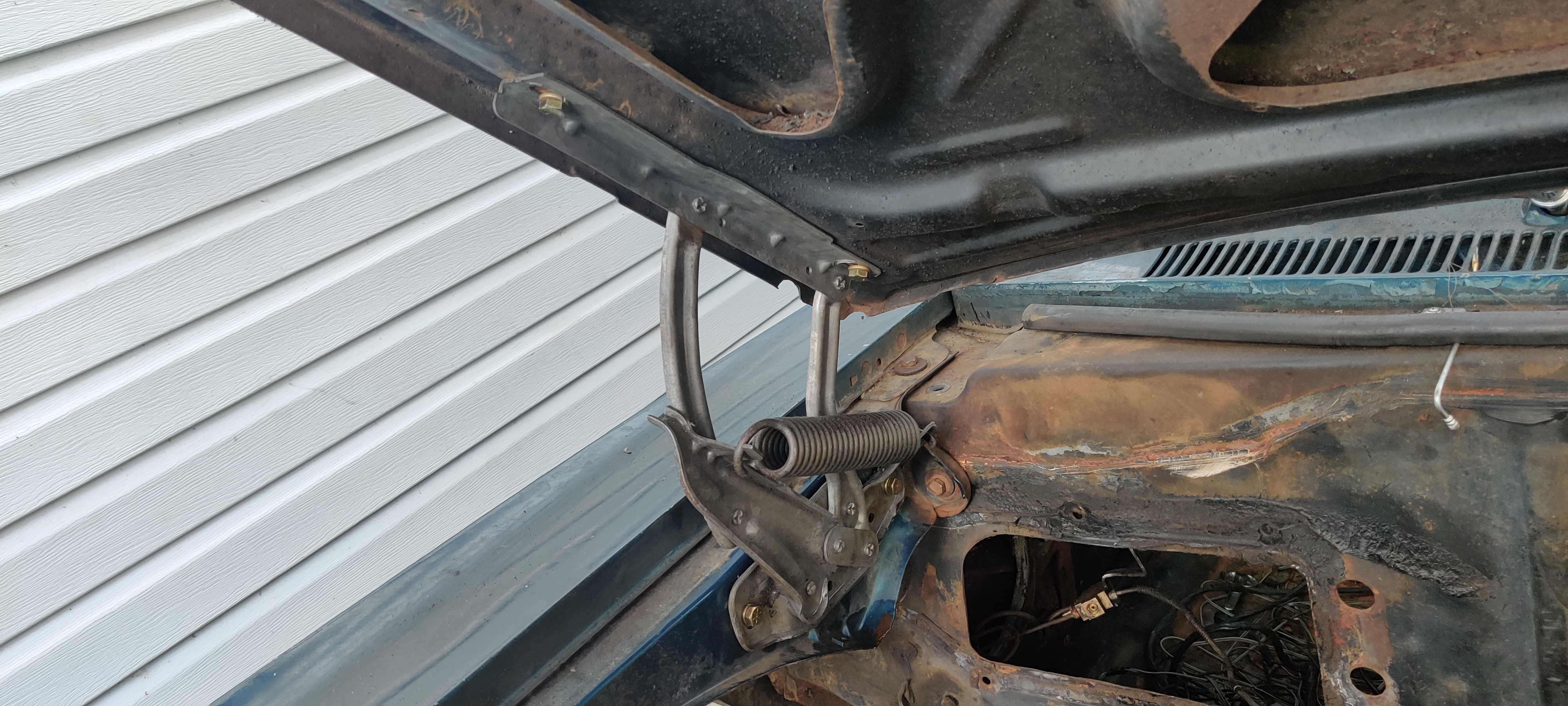 Hood reinstalled on cleaned up hinges